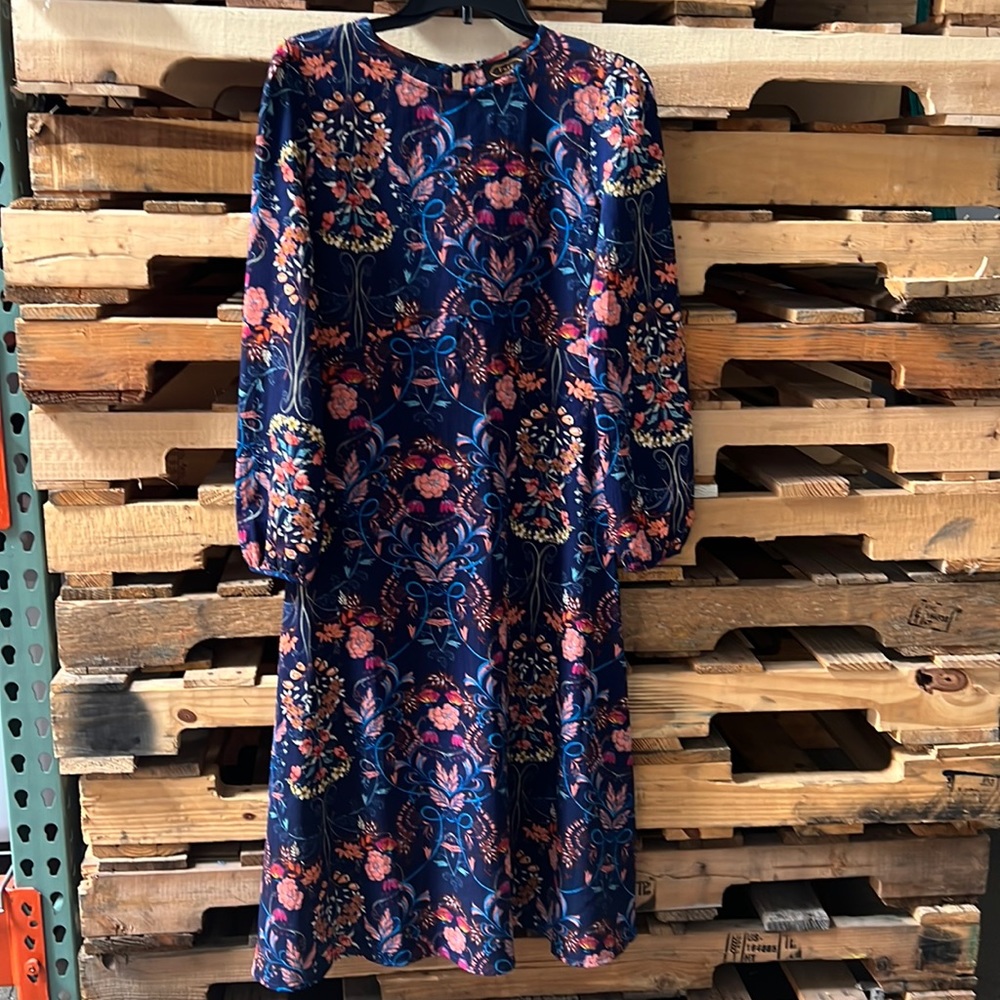 Fury floral dress , mid length , fitted at the bust. Sz s